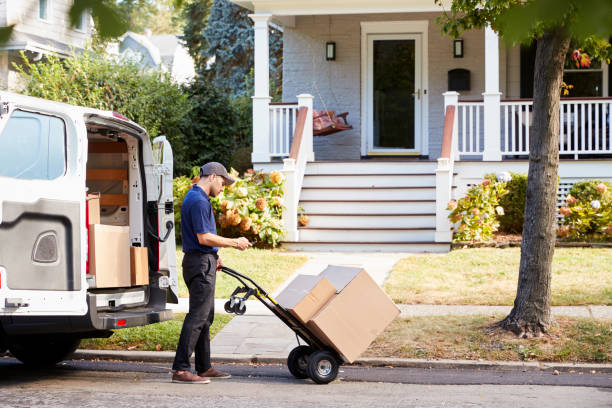 Courier Knocking On Door Of House To Deliver Package Courier Knocking On Door Of House To Deliver Package home delivery stock pictures, royalty-free photos & images