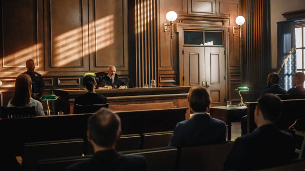 Court of Justice Trial: Impartial Judge is Sitting, Public Stands. Supreme Federal Court Judge Starts Civil Case Hearing. Sentencing Law Offender. stock photo