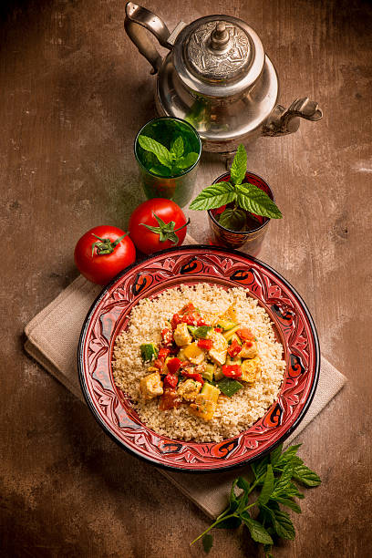 couscous with fish and vegetables stock photo
