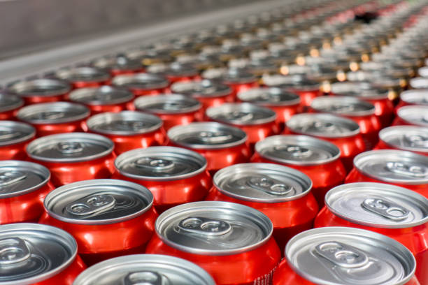 Cover alumiunum cans. Aluminum cans. Top view. Aluminum cans in the market Cover alumiunum cans. Aluminum cans. Top view. Aluminum cans in the market cola stock pictures, royalty-free photos & images