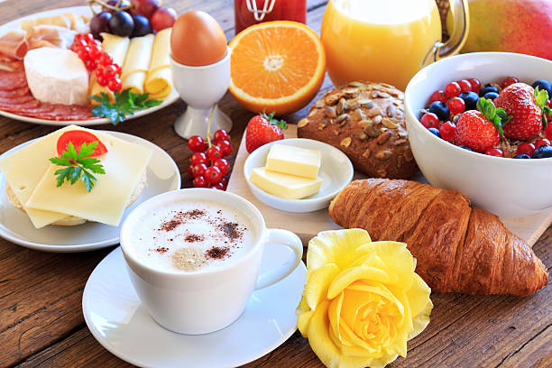 covered breakfast table stock photo