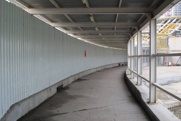 Covered Scaffolding Over Pedestrian Walkway stock photo