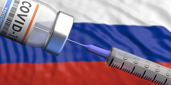 Covid-19 vaccination, flu prevention, immunization concept. Vial dose and medical syringe, russian flag background. 3d illustration