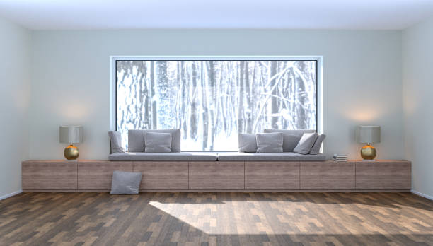 A cozy bench at a large panoramic window with built-in storage space. On the outside a winter landscape with trees. 3d render A cozy bench at a large panoramic window with built-in storage space. On the outside a winter landscape with trees. 3d render alcove window seat stock pictures, royalty-free photos & images