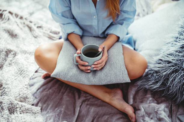 Cozy morning with coffee in the bed stock photo