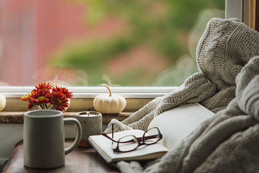 A Cozy Reading Nook In The Fall With A Blanket And Coffee Stock Photo ...