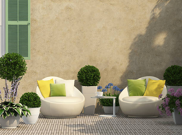 Cozy terrace in the garden Cozy terrace in the garden with flowers courtyard stock pictures, royalty-free photos & images
