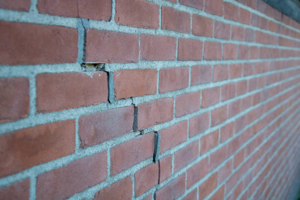 Crack in Brick Wall caused by subsidence Crack in Brick Wall caused by subsidence groningen city stock pictures, royalty-free photos & images