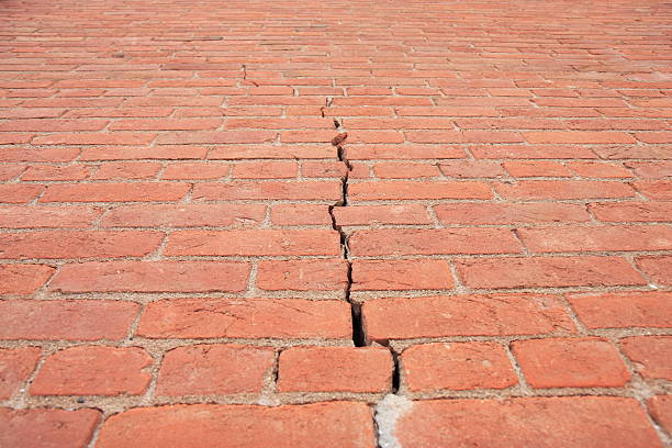 Cracked Brick Wall Background stock photo