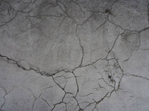 Cracked concrete texture background Cracked concrete texture background crevice stock pictures, royalty-free photos & images