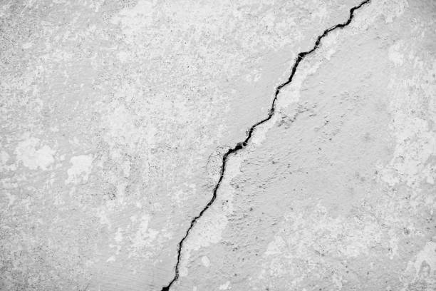 Cracked White Wall Texture Background  adobe backgrounds stock pictures, royalty-free photos & images