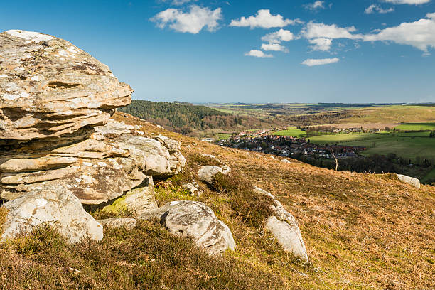 Crags over Rothbury Rothbury Town in the Coquet Valley Northumberland viewed from the Rothbury Terraces rothbury northumberland stock pictures, royalty-free photos & images