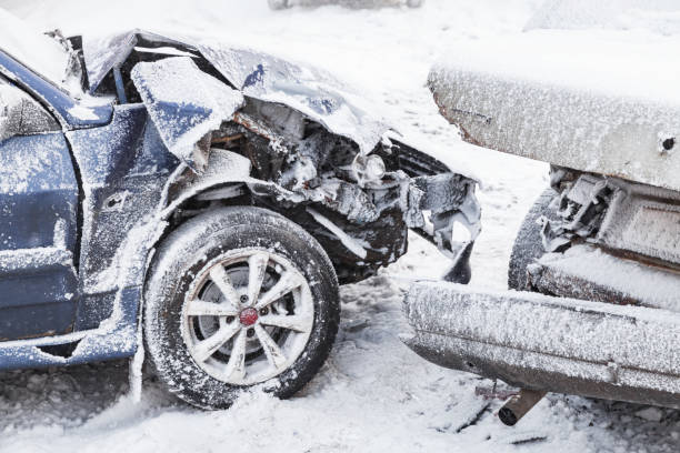 Crashed cars right after an accident Crashed cars right after an accident on winter road with snow cold temperature photos stock pictures, royalty-free photos & images