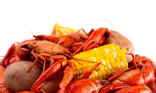 Crawfish Boil with Corn on the Cob and Potatoes Crawfish Boil with Corn on the Cob and Potatoes boiled stock pictures, royalty-free photos & images
