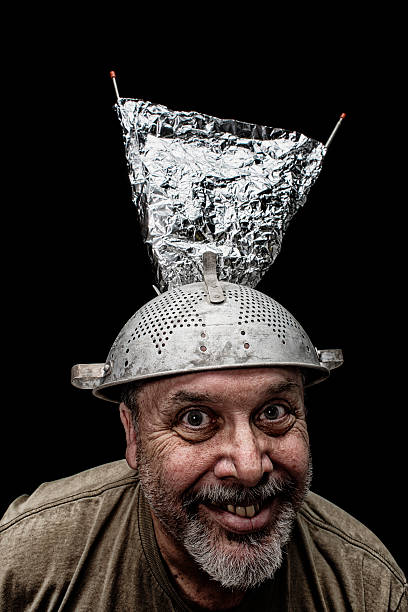 crazy-guy-wearing-a-colander-with-antenni-as-a-hat-picture-id535044909