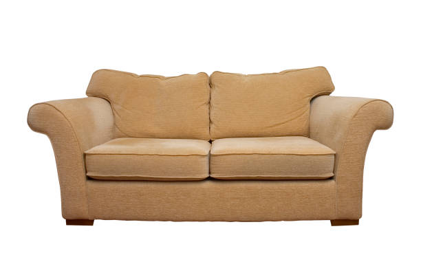 Cream comfortable sofa isolated on white background stock photo
