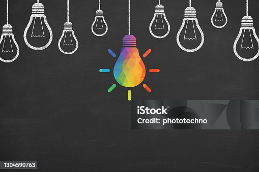 istock Creative idea concepts with light bulbs on a blackboard background 1304590763