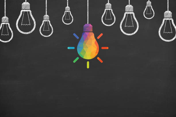 Creative idea concepts with light bulbs on a blackboard background stock photo