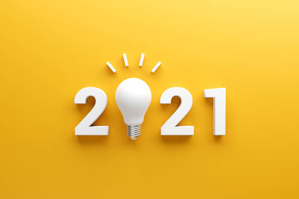 2021 creativity inspiration concepts, Light bulb idea with 2021 new year, planning ideas. 2021 creativity inspiration concepts, Light bulb idea with 2021 new year on yellow background, planning ideas. 2021 stock pictures, royalty-free photos & images