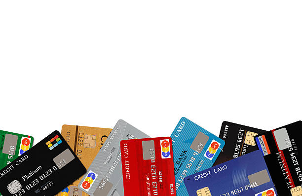 Credit card Colorful stack of credit cards on white background pile of credit cards stock pictures, royalty-free photos & images