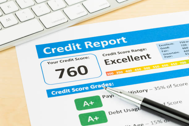 Credit score report with keyboard stock photo