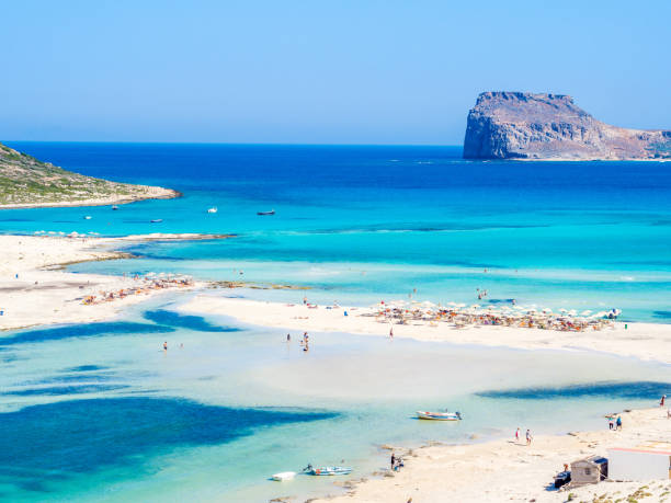 Crete, Greece: Balos lagoon paradisiacal view of beach and sea, one of the most tourist destinations on west of Crete. stock photo