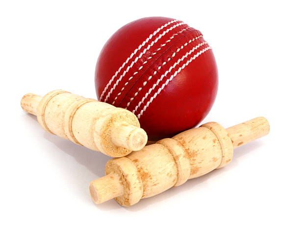Cricket Ball and bails stock photo