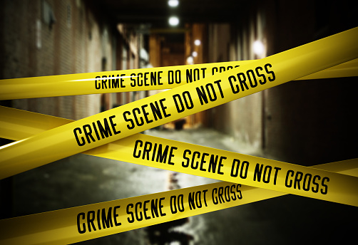 Crime Scene Police Tapes In Front Of A Dark Alley Stock Photo - Download Image Now - iStock