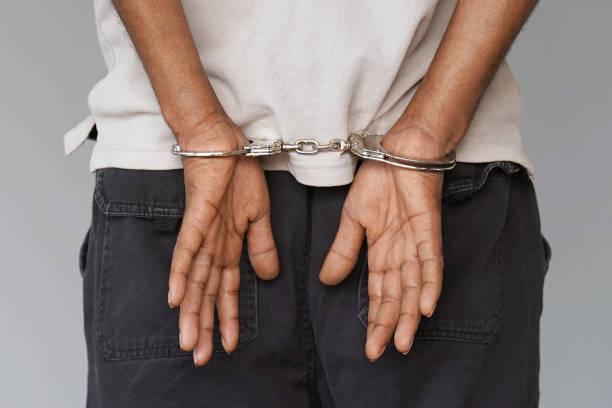 Black Person In Handcuffs Stock Photos, Pictures & Royalty-Free Images ...