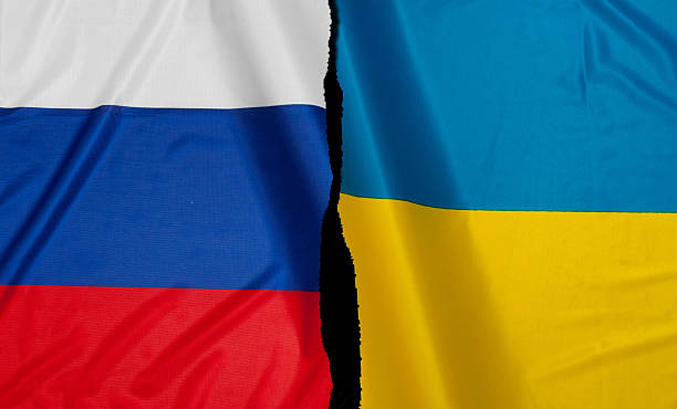Crisis - Russia / Ukraine Crisis - Russian Flag and Ukrainian Flag russia stock pictures, royalty-free photos & images