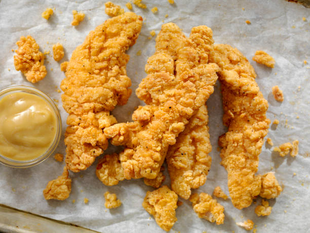Crispy Chicken Strips Crispy Chicken Strips crunchy stock pictures, royalty-free photos & images