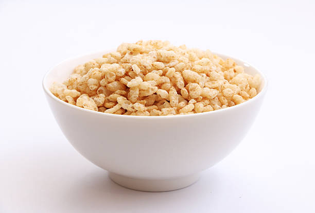 Crispy Rice Cereal 1 Start your morning with a giant bowl of crispy rice cereal. crunchy stock pictures, royalty-free photos & images