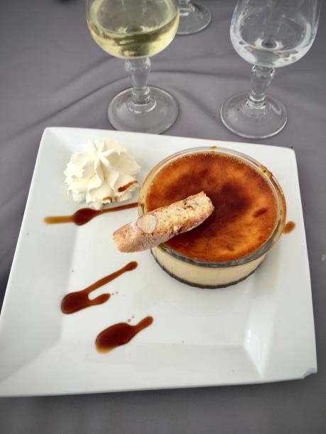 Crème brûlée, biscuit cream and white wine. stock photo