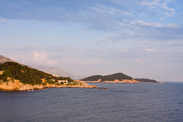 croatian shore line with a church stock photo
