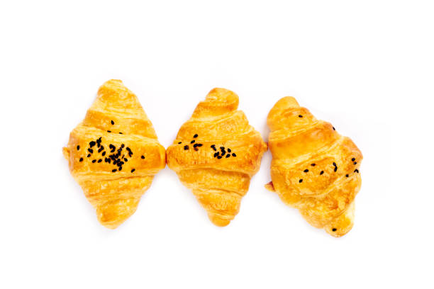 Croissant with Black Sesame Seeds on white background. stock photo
