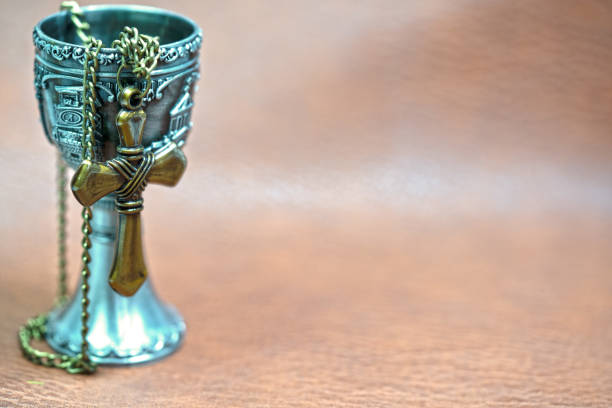 cross and  cup selective focus for background and inspiration cross and  cup selective focus for background and inspiration antiquities stock pictures, royalty-free photos & images