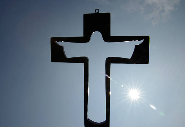Cross in silhouette  good friday stock pictures, royalty-free photos & images