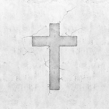 Blank concrete grey wall background with cross symbol
