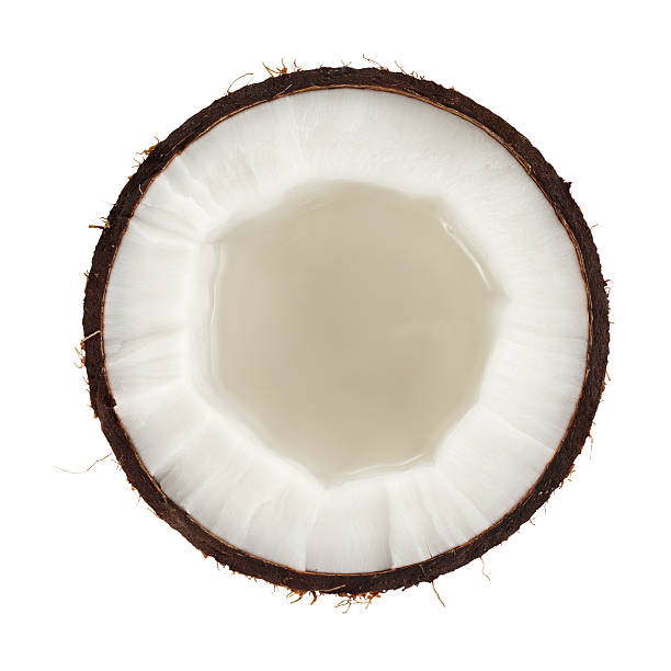 Cross section of a coconut on white background stock photo