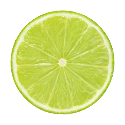 Close up of lemons and green limes isolated over white