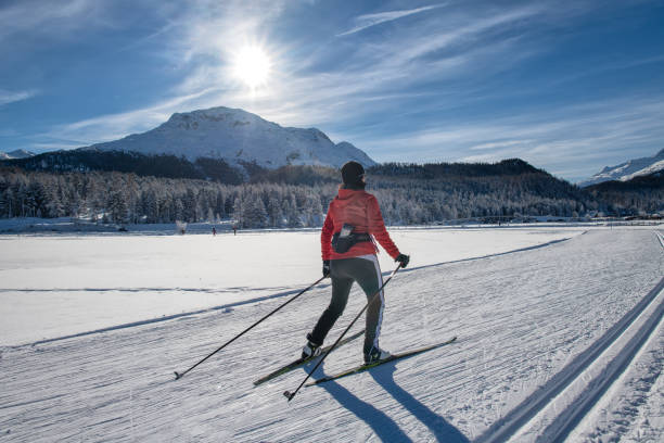 Cross-country skiing of a free technique woman. Skating stock photo