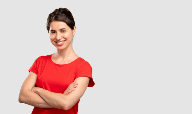 crossed arms confident woman happy lady stock photo