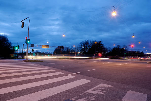 Crossing traffic at night stock photo