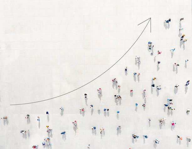 Crowd from above forming a growth graph Crowd from above forming a growth graph growth stock pictures, royalty-free photos & images