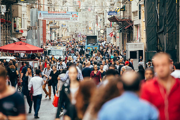 crowded istiklal street in istanbul - beyoglu stockfoto's en -beelden