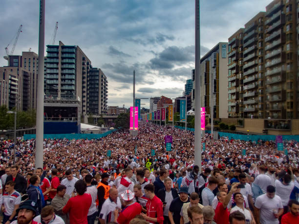 Crowds along Olympic Way outside Wembley Stadium before the Euro 2020 final in London, UK stock photo