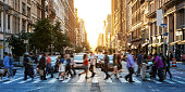 istock Crowds of people walking across a busy crosswalk at the intersection of 23rd Street and 5th Avenue in Manhattan New York City 1367851585