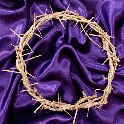 Crown Of Thorns On A Square Purple Satin Background Stock Photo ...