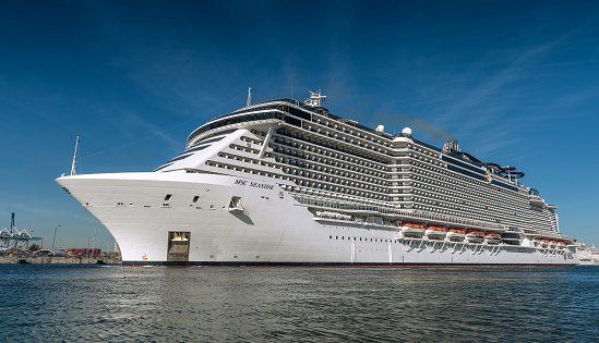 Miami, FL, USA - April 22, 2020: Cruise ships stopped at the port due to the global crisis of the Coronavirus epidemic (COVID-19) in the Port of Miami, one of the busiest ports in the United States.