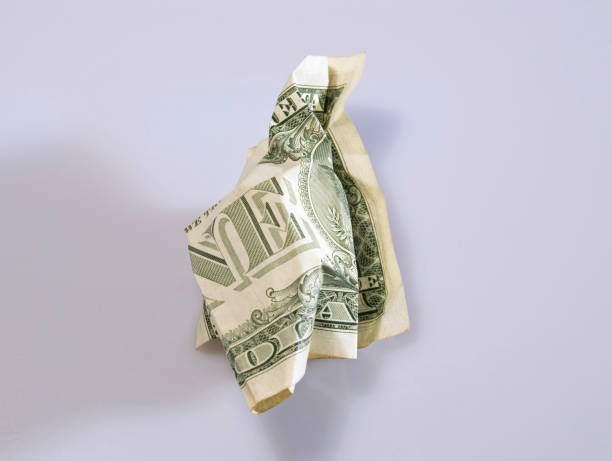 crumpled dollar stock photo